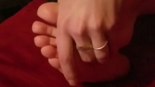 Wife rubbing her feet