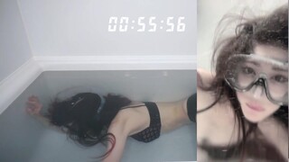 Japanese woman holding her breath in the bathtub 3