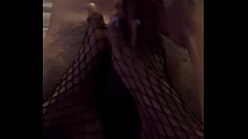 Fishnet footjob