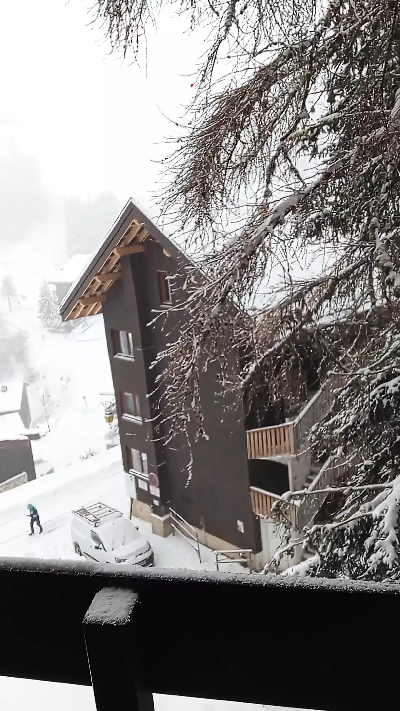 On the Balcony with Snow