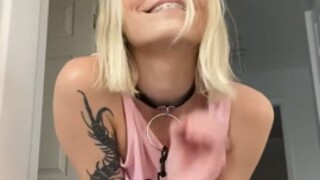 gamer girl strips and plays with her smooth pussy