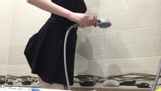 Teen takes off dress in shower