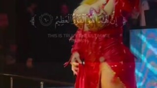 Boosy belly dancer Quran