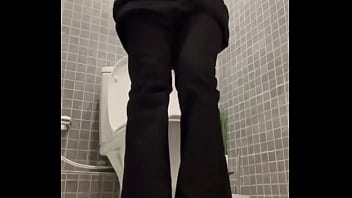 Public Toilet Plug Play In the privacy of a public bathroom, I lower my pants, showcasing my pierced belly butto...