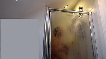 Curvy MILF tweaks nipples in shower