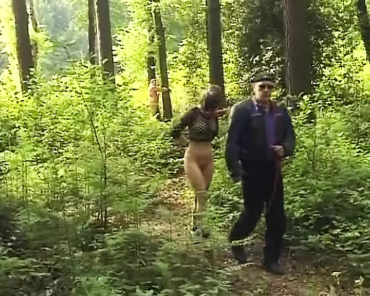 Horny German couple gets tied up and spanked hard in the woods