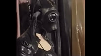 Natalia Muehlhausen latex slave in hood and gasmask gets a good fuck from her master (from 'Gummi in der Ehe')