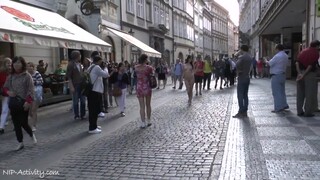 Woman takes a long nude walk through the streets