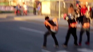 three guys mooning the traffic at a stoplight