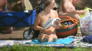 topless hippie at non-nude beach