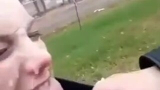 Shooting cum in blondes face in a park