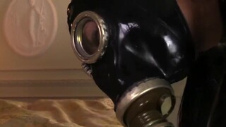 Solo rubber suit gas mask dildo play