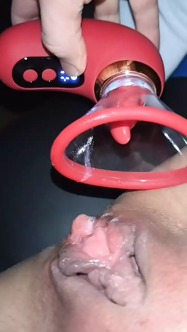 Wet horny MIILF's pussy with red toy